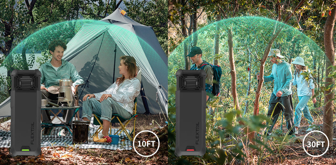 Flextail Max Repeller S — campsite scene beside tent and lantern.