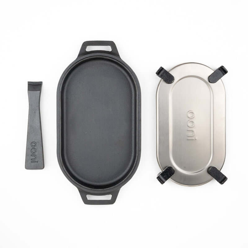 Ooni Cast Iron Sizzler Pan with wooden base for outdoor cooking