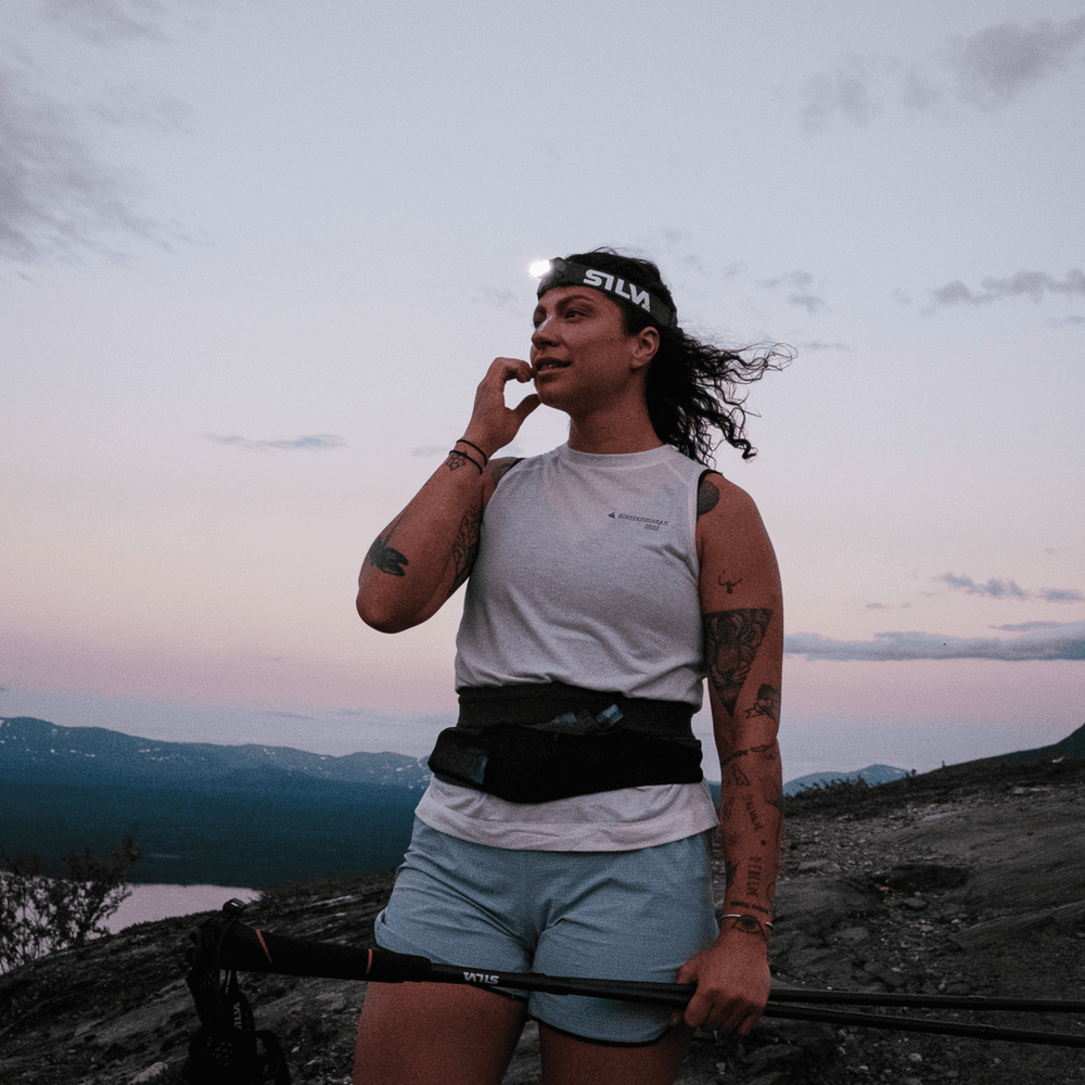 Silva Strive Loop Running Belt — reflective logo for visibility in low light.