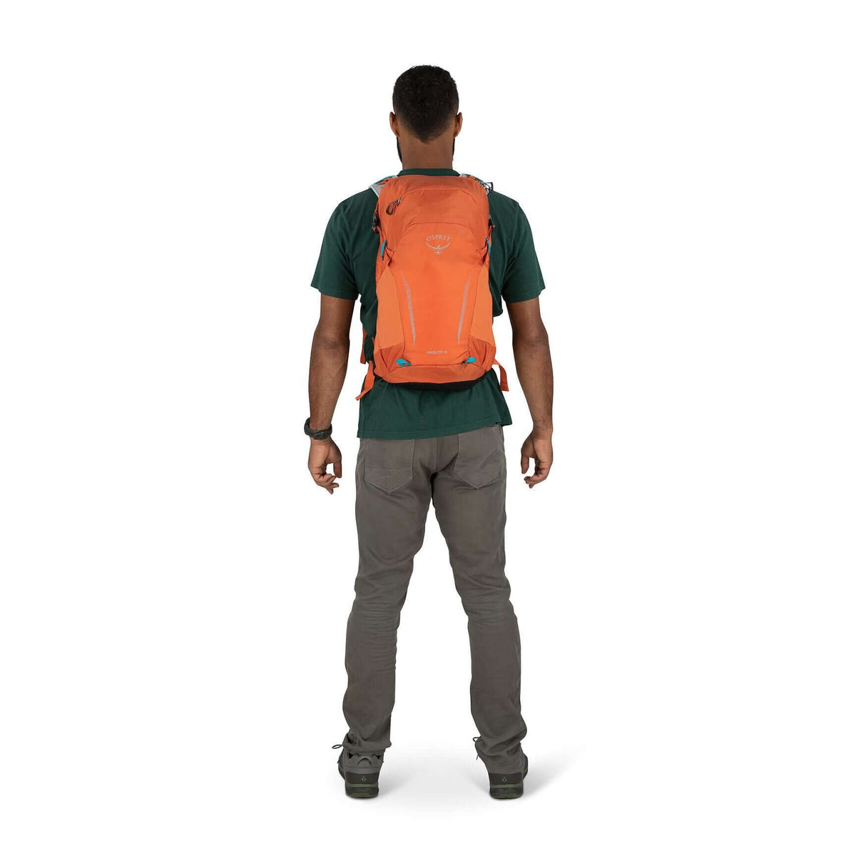 Man wearing Osprey Hikelite 18 daypack with AirSpeed ventilation, showcasing the lightweight and streamlined design ideal for hiking.