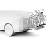 Thule VeloSpace XT Bike Adapter attached to car, increasing bike rack capacity with Thule brand, for carrying extra bikes.