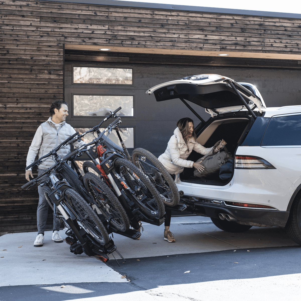 Thule Verse add-on - 2 Bike accessory on a vehicle, showcasing the extended capacity for 4 bikes with Thule brand hitch rack.
