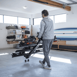 Man installing Thule Verse add-on - 2 Bike accessory on platform hitch rack in garage