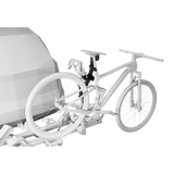 Thule Verse Bike Repair Holder attached to bike for trailhead adjustments and repairs, showcasing seamless integration with Thule products.