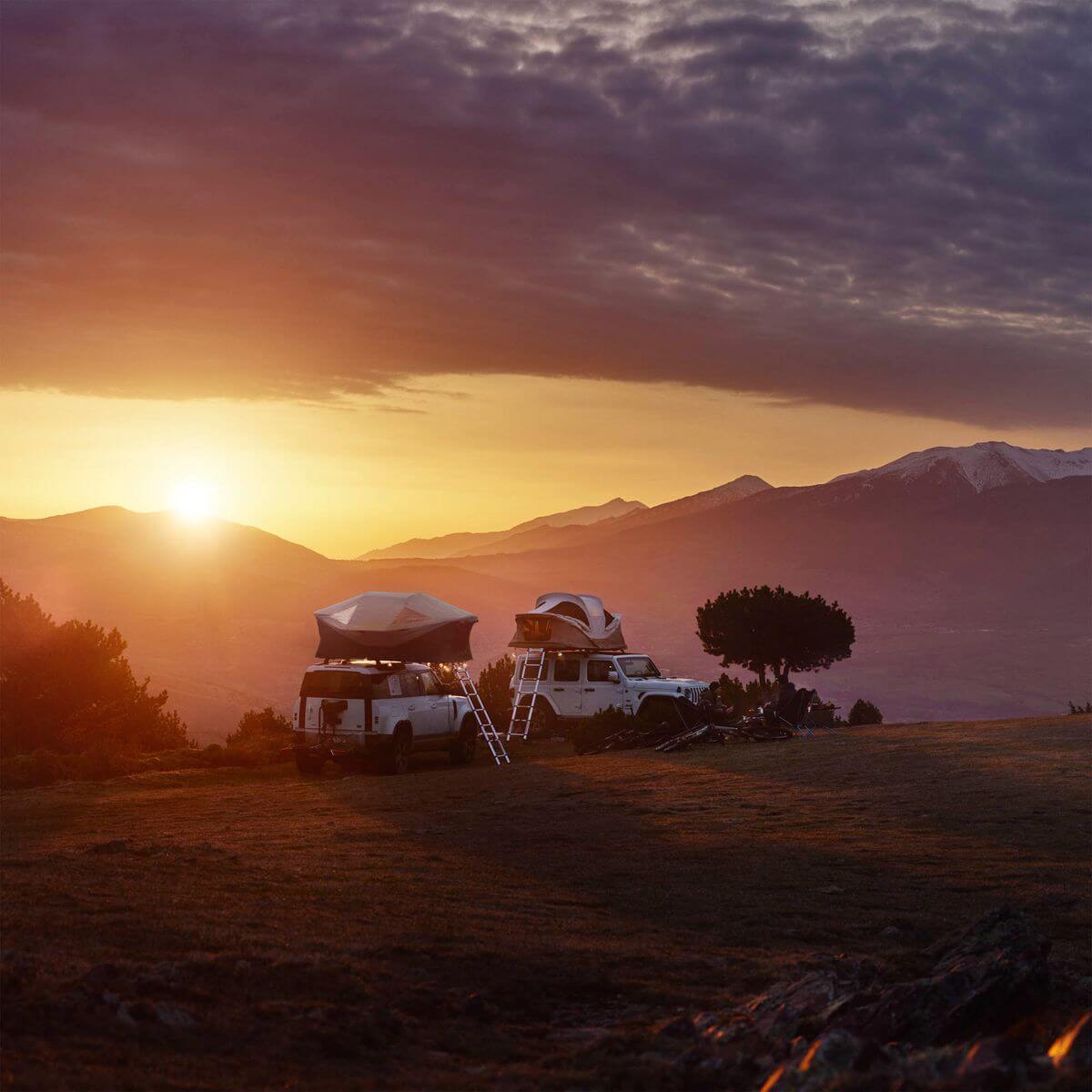 Thule Approach - Car Roof Top Tents by Thule, ideal for adventure travel and comfort, pictured at sunset on rugged terrain.