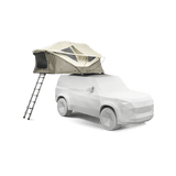 Car with Thule Approach - Car Roof Top Tents on top for adventure travel