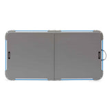 Core Equipment 4 Foot Outdoor Table with FlexRail — folded size comparison around 25 x 26 inches for transport.