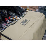 ARB Tool Roll Bag — removable pouches detached and arranged on a workbench.