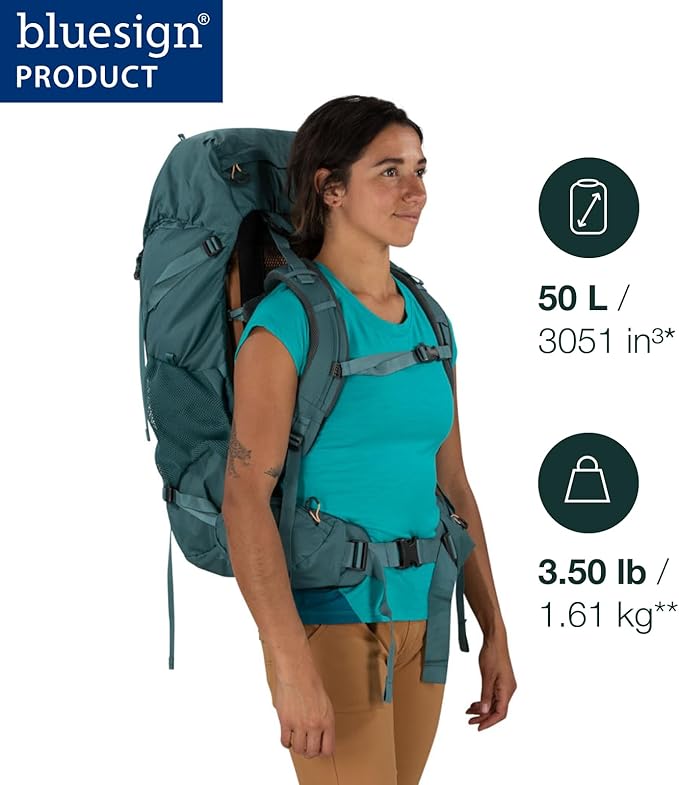 Woman wearing Osprey Renn 50L - Women backpack, showcasing 50L capacity and 3.50 lb weight, bluesign approved