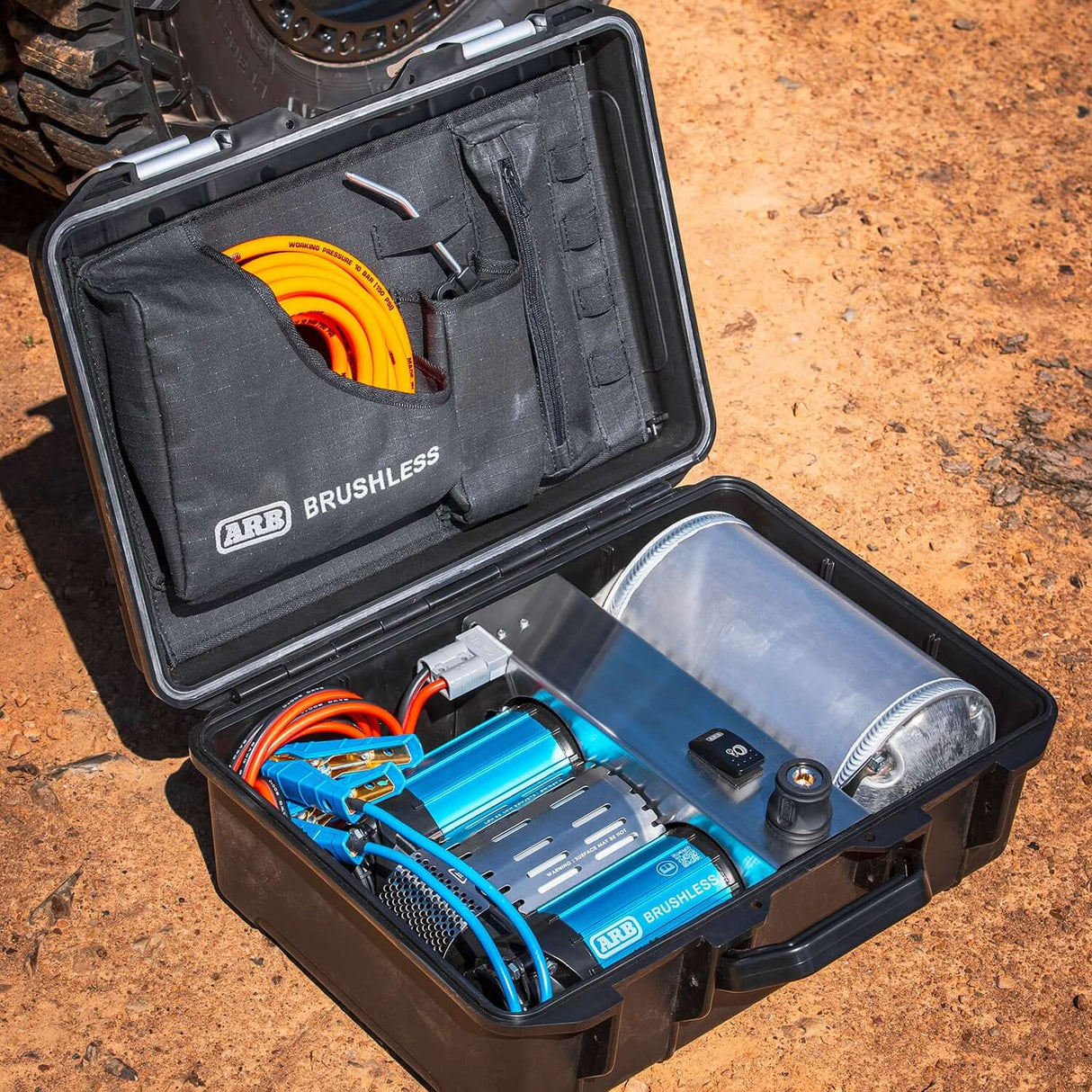 ARB Portable Brushless Twin Motor Onboard 12V Air Compressor outside in the UAE Desert