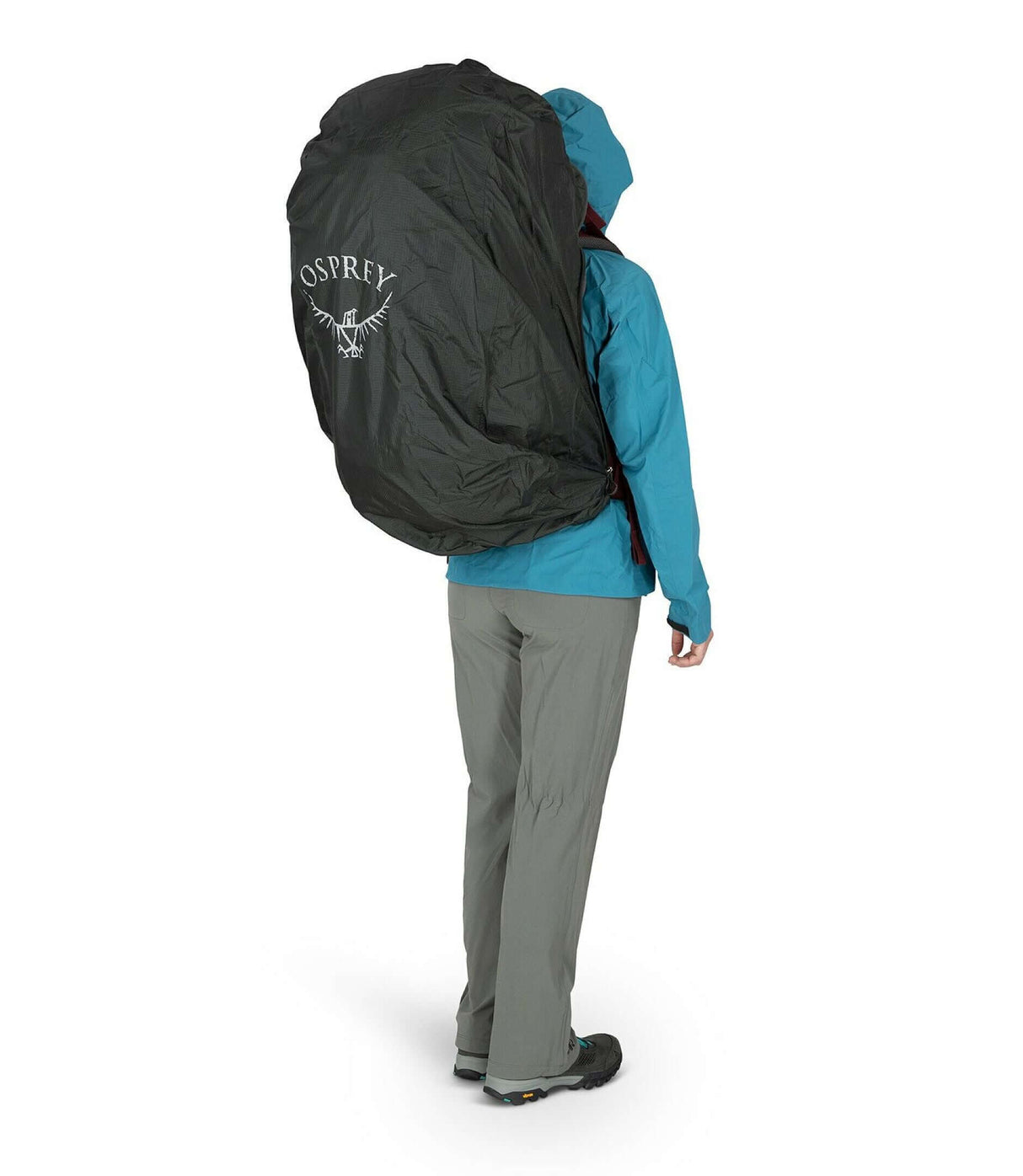 Woman wearing Osprey backpack with Fairview Trek 70 - Women AirCover® for travel and adventure.
